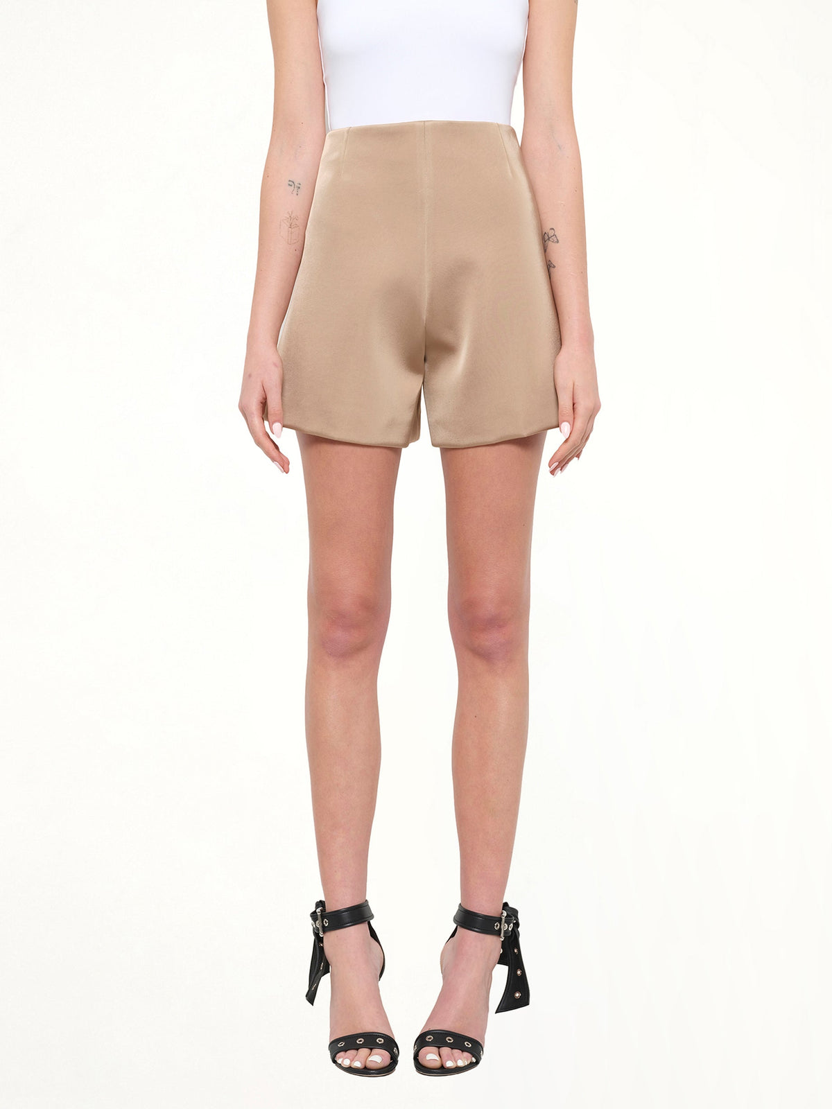 Image of a model wearing Pants. Product name - Pants in Skin colour by brand - NEIL BARRETT