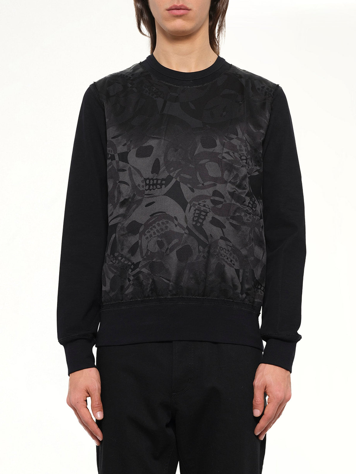 Image of a model wearing Outerwear. Product name - AMQ Sweatshirt in Black colour by brand - ALEXANDER MCQUEEN