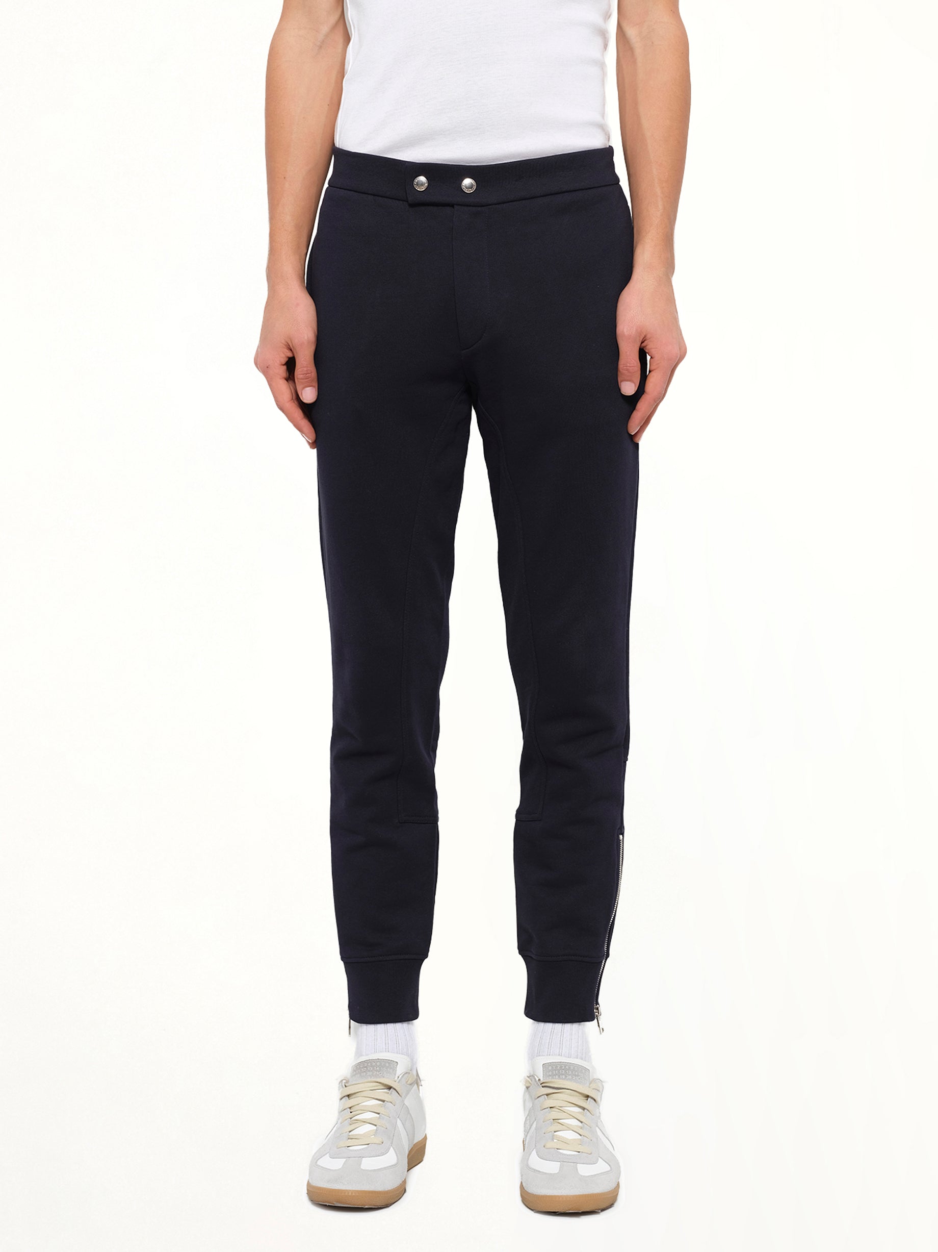 Image of a model wearing Pants. Product name - Alexander McQueen Pants in Navy colour by brand - ALEXANDER MCQUEEN