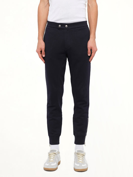 Image of a model wearing Pants. Product name - Alexander McQueen Pants in Navy colour by brand - ALEXANDER MCQUEEN