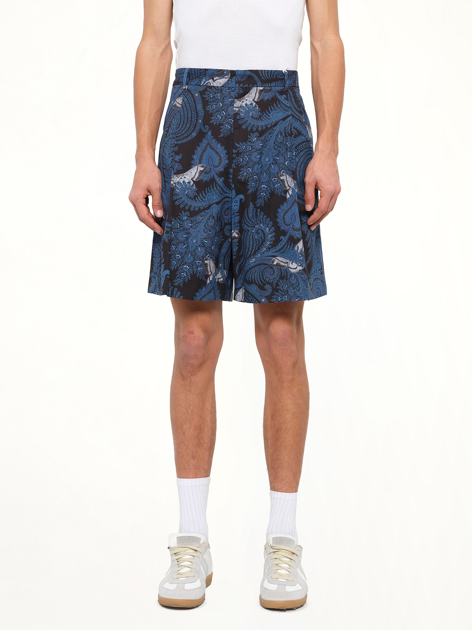 Image of a model wearing Shorts. Product name - Bermuda in 415 colour by brand - GIVENCHY