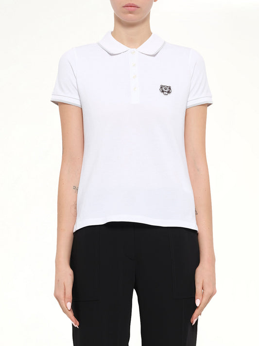 Image of a model wearing Tops. Product name - Kenzo Polo in White colour by brand - KENZO