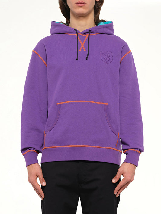 Image of a model wearing Outerwear. Product name - Loewe ELN Hoodie in Purple colour by brand - LOEWE