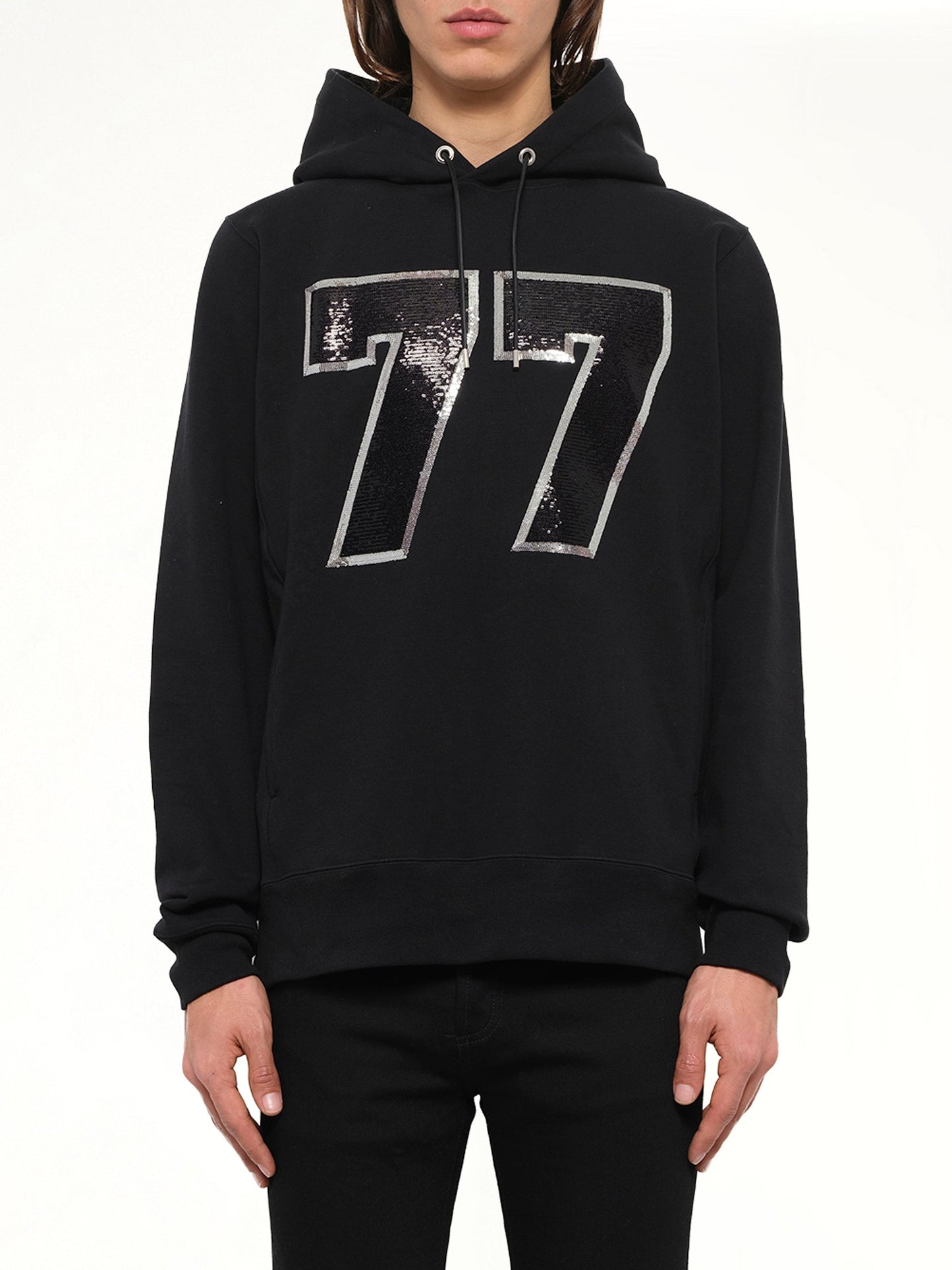 Image of a model wearing Outerwear. Product name - Mastermind Logo Sweatshirt in Black colour by brand - MASTERMIND