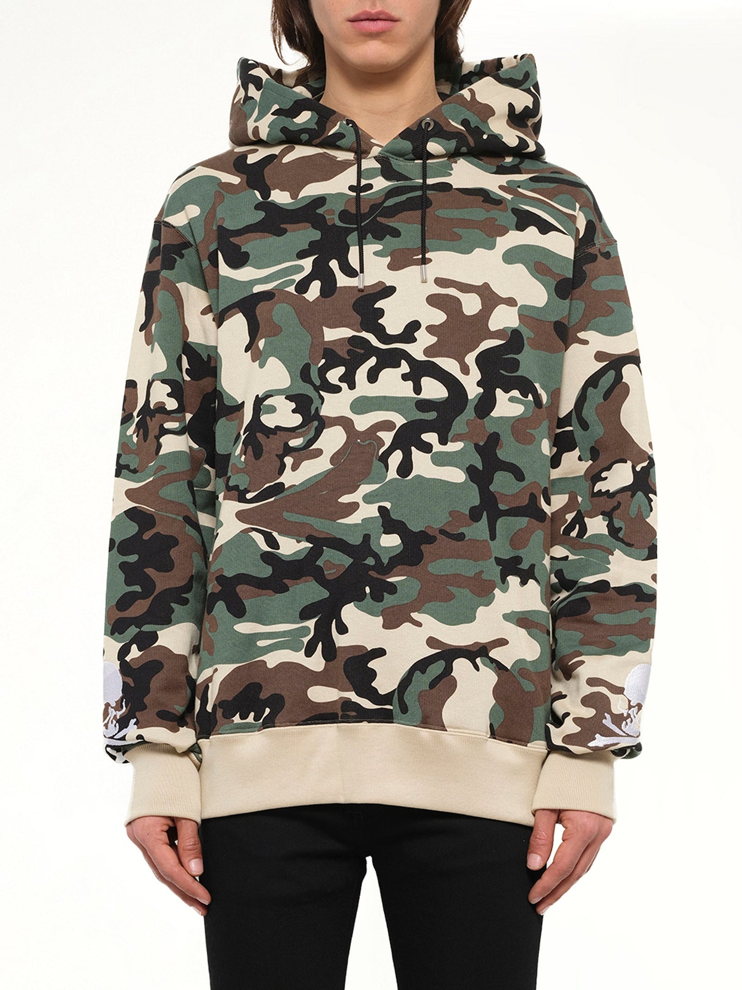 Image of a model wearing Outerwear. Product name - Mastermind Logo Sweatshirt in Camo colour by brand - MASTERMIND