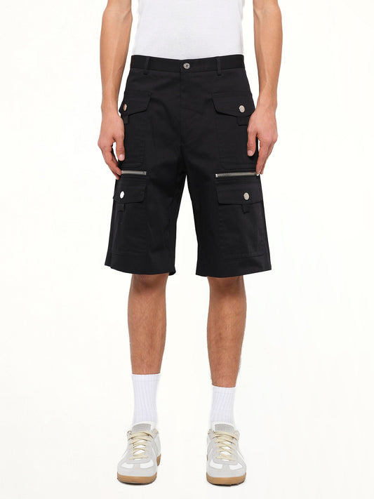 Image of a model wearing Shorts. Product name - Pockets Shorts in Black colour by brand - GIVENCHY