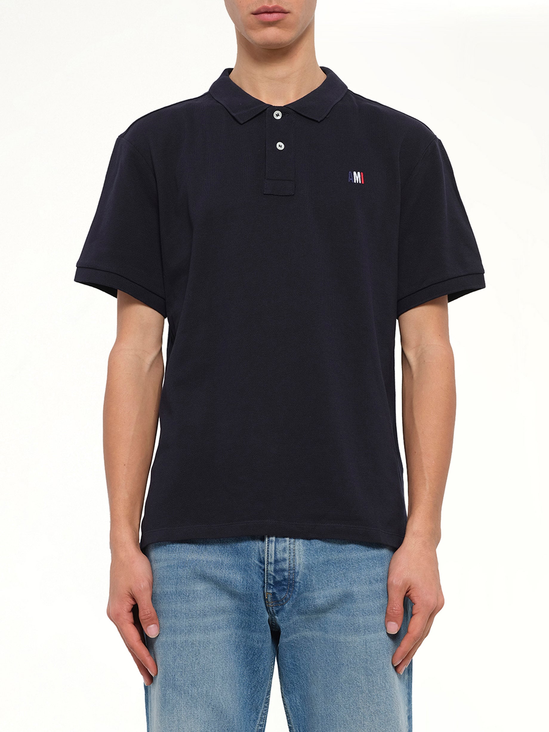 Image of a model wearing Tops. Product name - Buttoned Polo in Navy colour by brand - MIX