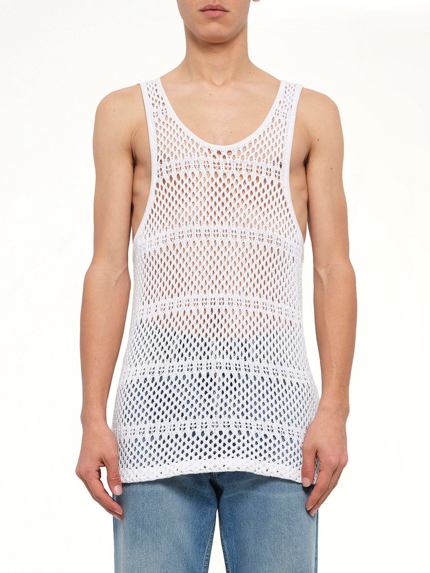 Image of a model wearing Tops. Product name - Crochet Tank Top in White colour by brand - AMIRI