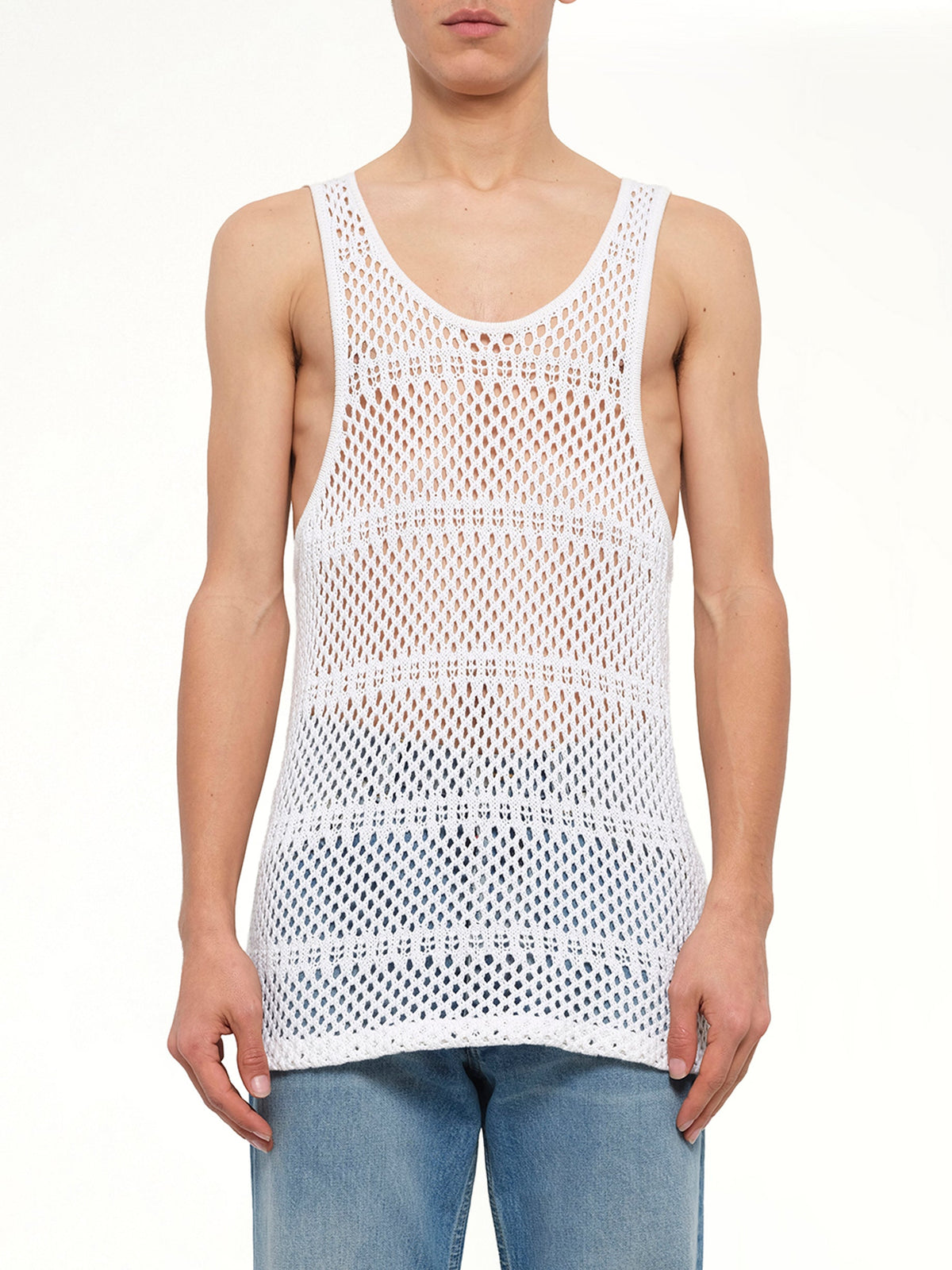 Image of a model wearing Tops. Product name - Crochet Tank Top in White colour by brand - AMIRI