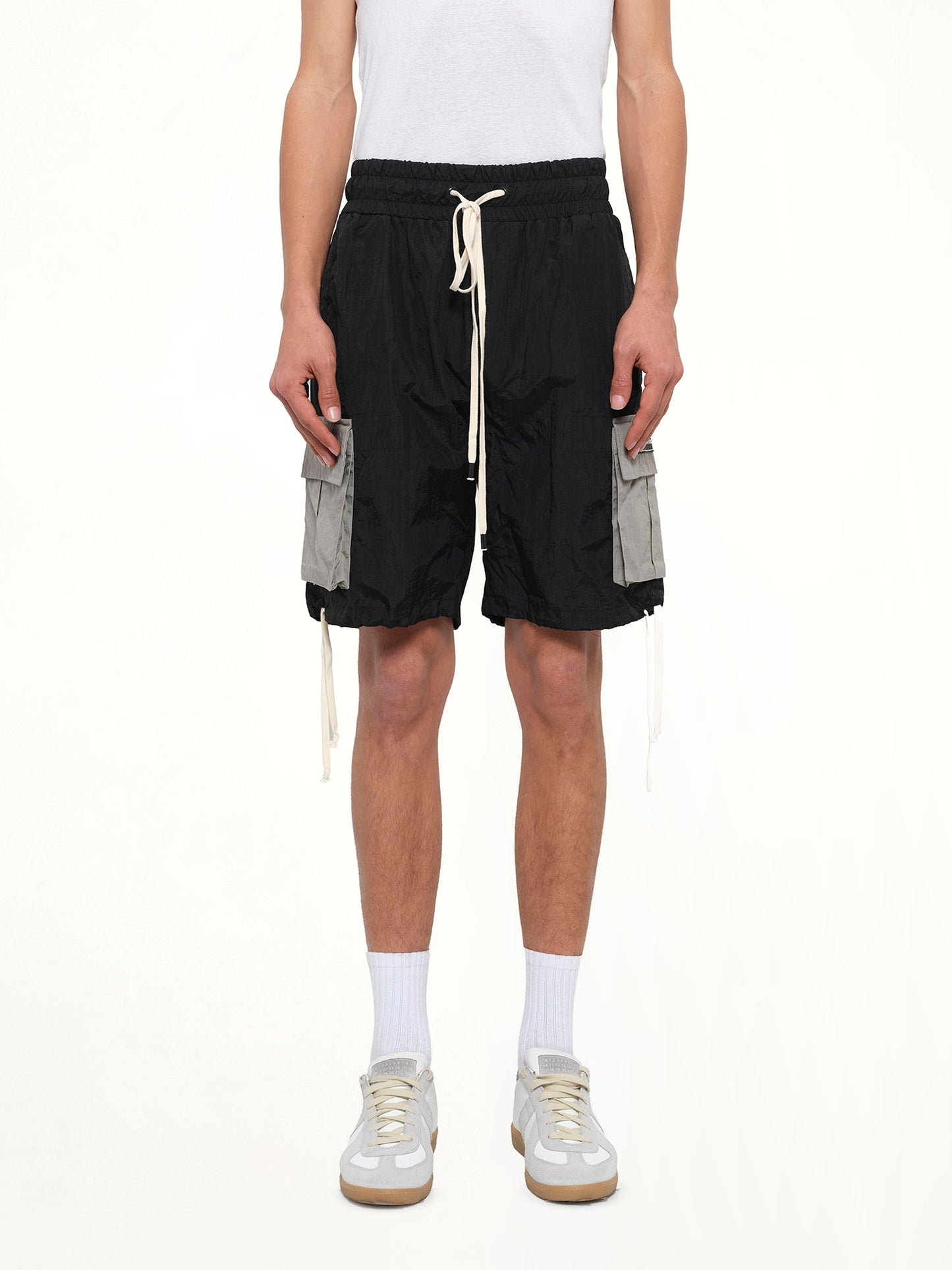 Image of a model wearing Shorts. Product name - M93 Cargo Short in Black colour by brand - DANIEL PATRICK