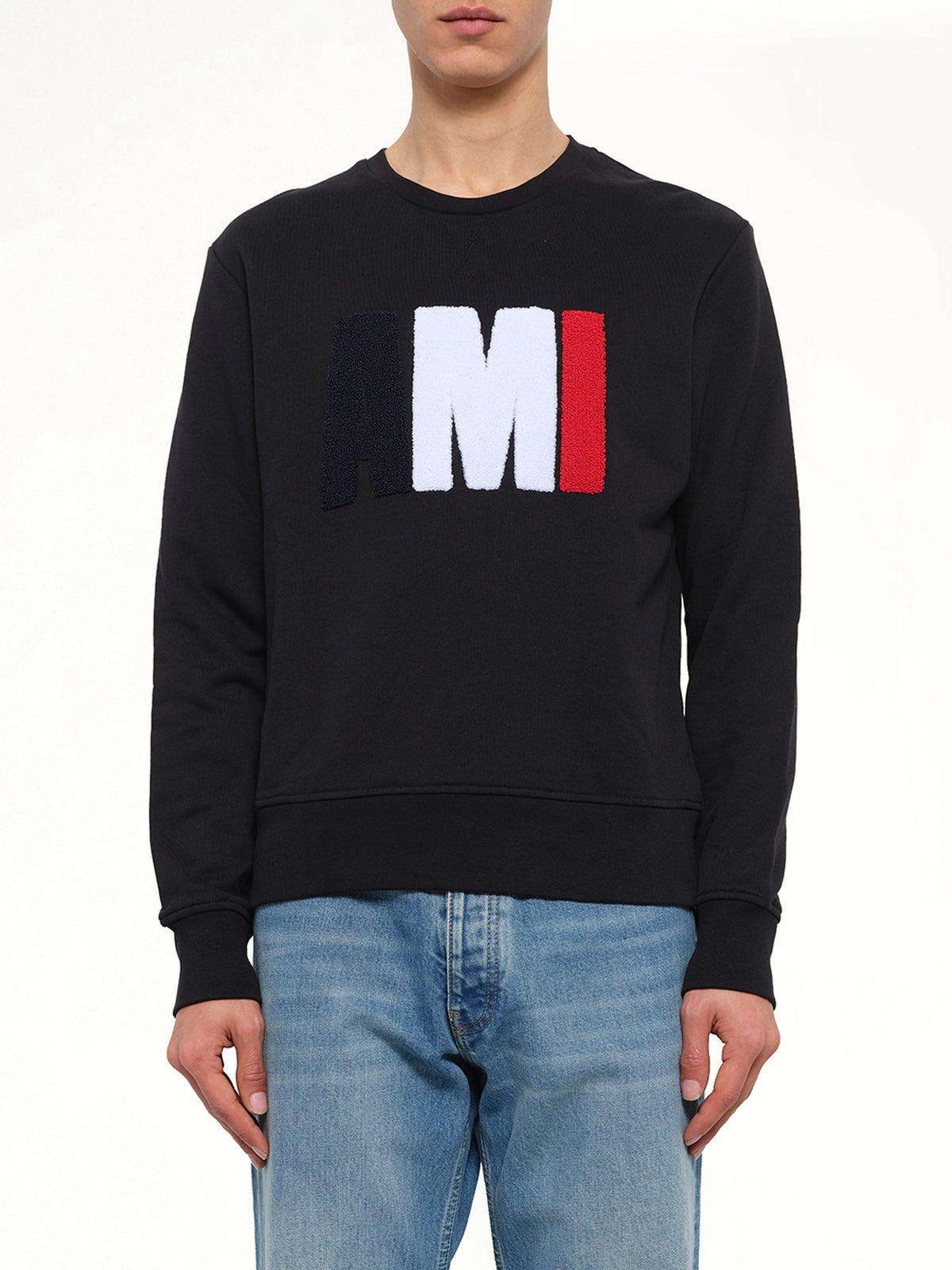 Image of a model wearing Outerwear. Product name - Mix Crew Sweatshirt in Black colour by brand - MIX