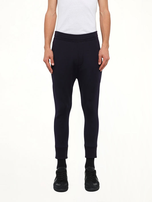 Image of a model wearing Pants. Product name - Neil Barrett Pants in Navy colour by brand - NEIL BARRETT
