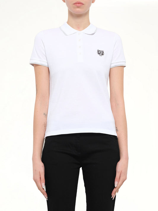 Image of a model wearing Tops. Product name - Tiger Polo in White colour by brand - KENZO