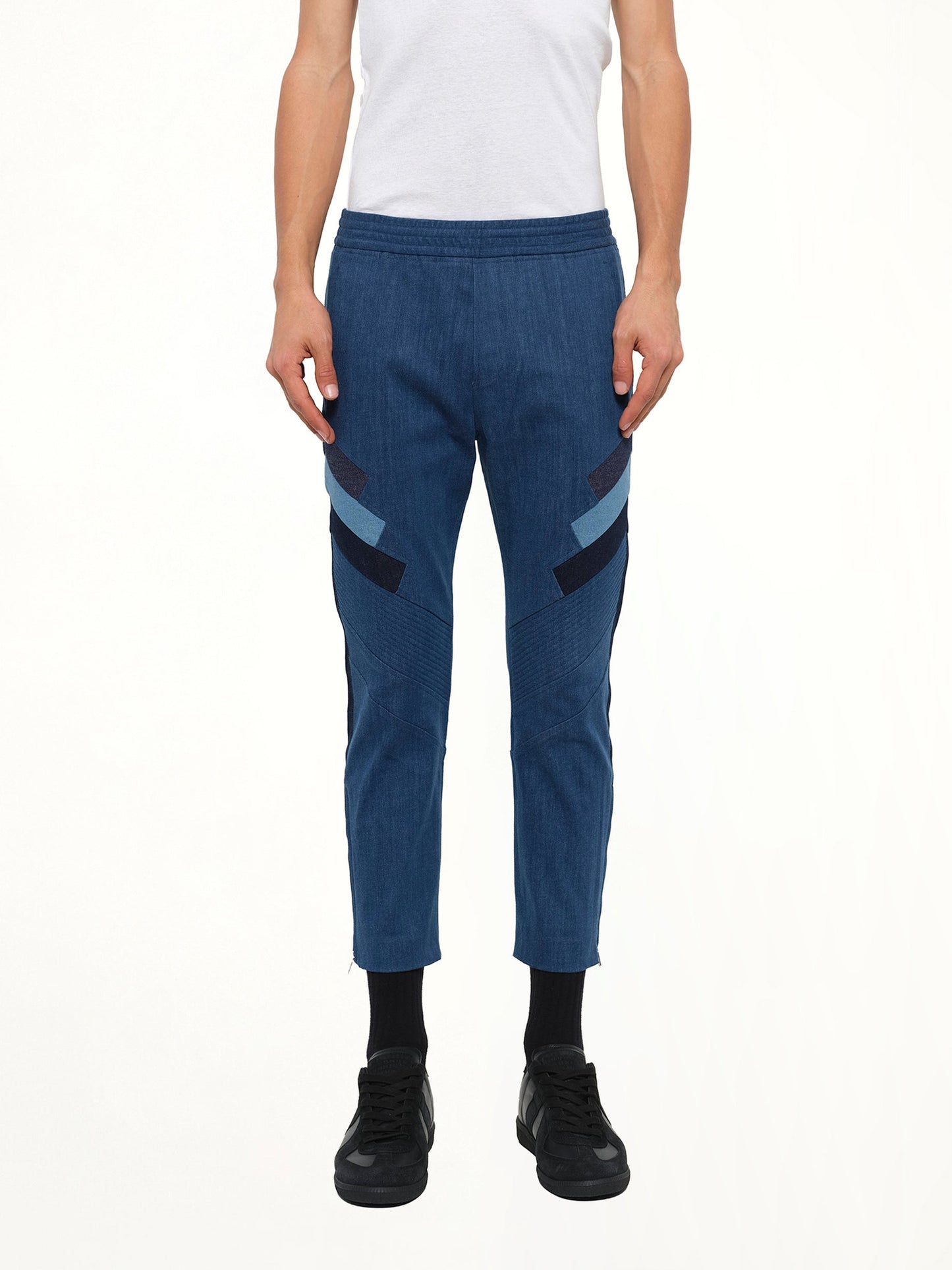 Image of a model wearing Pants. Product name - Trousers in Ind/Di colour by brand - NEIL BARRETT