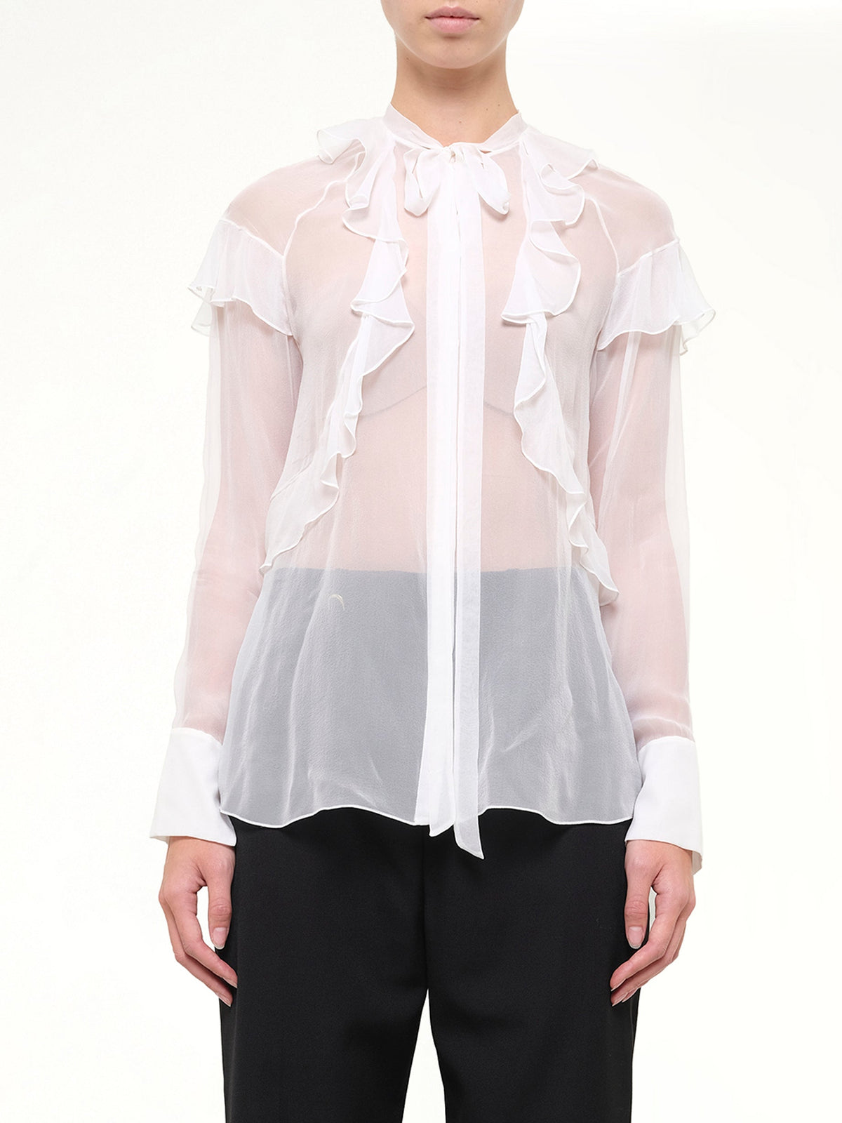 Image of a model wearing Tops. Product name - Long Sleeve Top in White colour by brand - GIVENCHY
