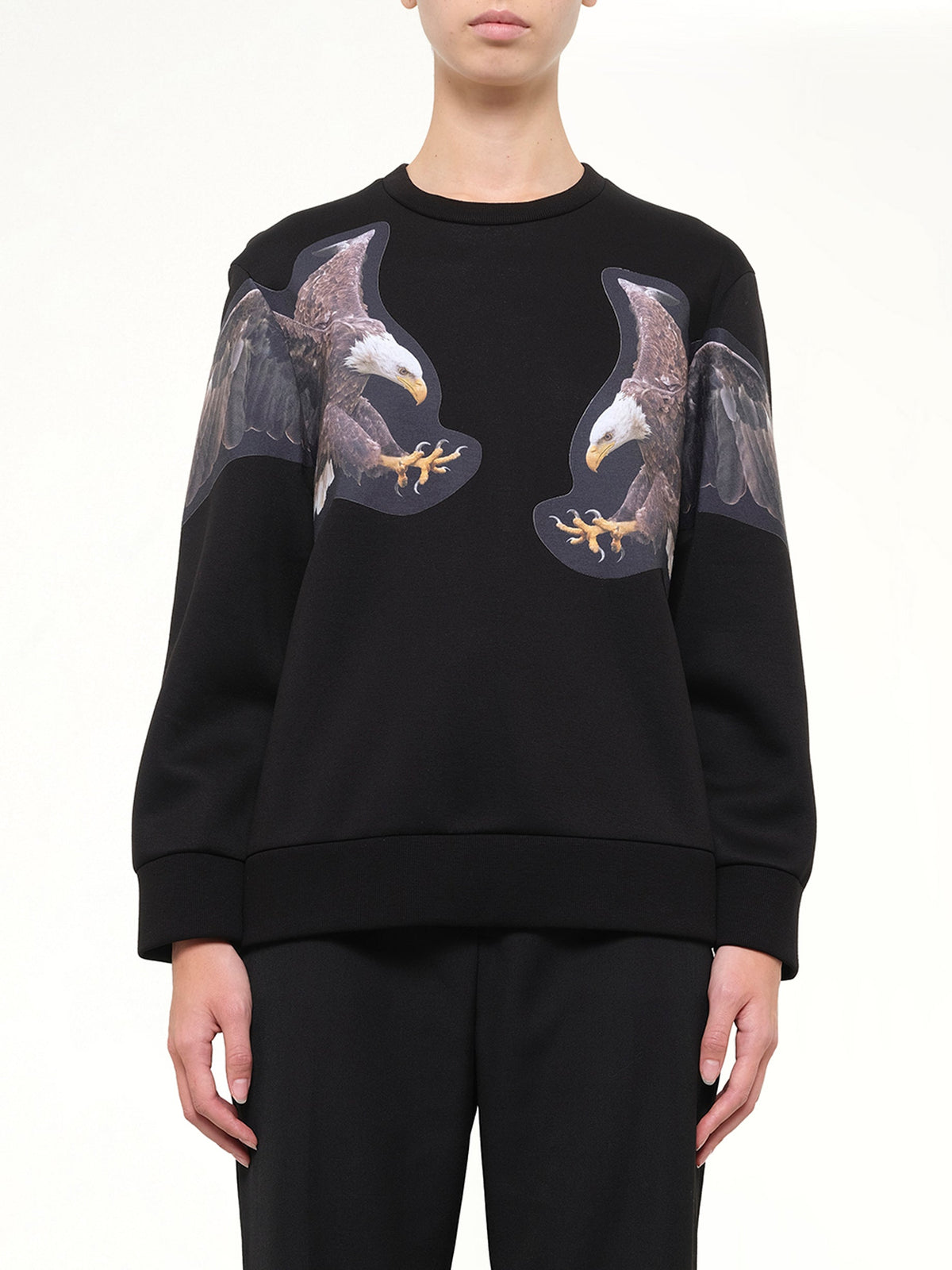 Image of a model wearing Outerwear. Product name - Neil Barrett Sweatshirt Njs46A in Black colour by brand - NEIL BARRETT