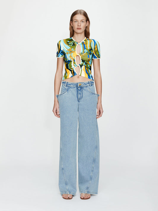 Image of a model wearing Denim. Productname: Christopher Esber Manta Sting Denim Jean in Indigo colour by brand - Christopher Esber