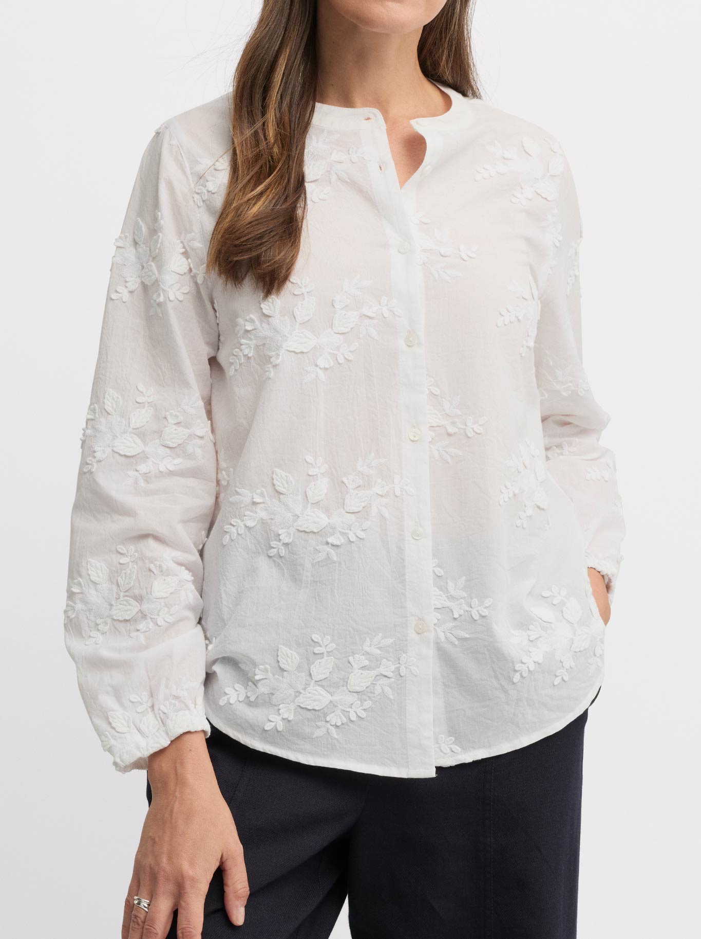 Image of a model wearing Tops. Product name - Yarra Trail Dainty Shirt in White colour by brand - Yarra Trail