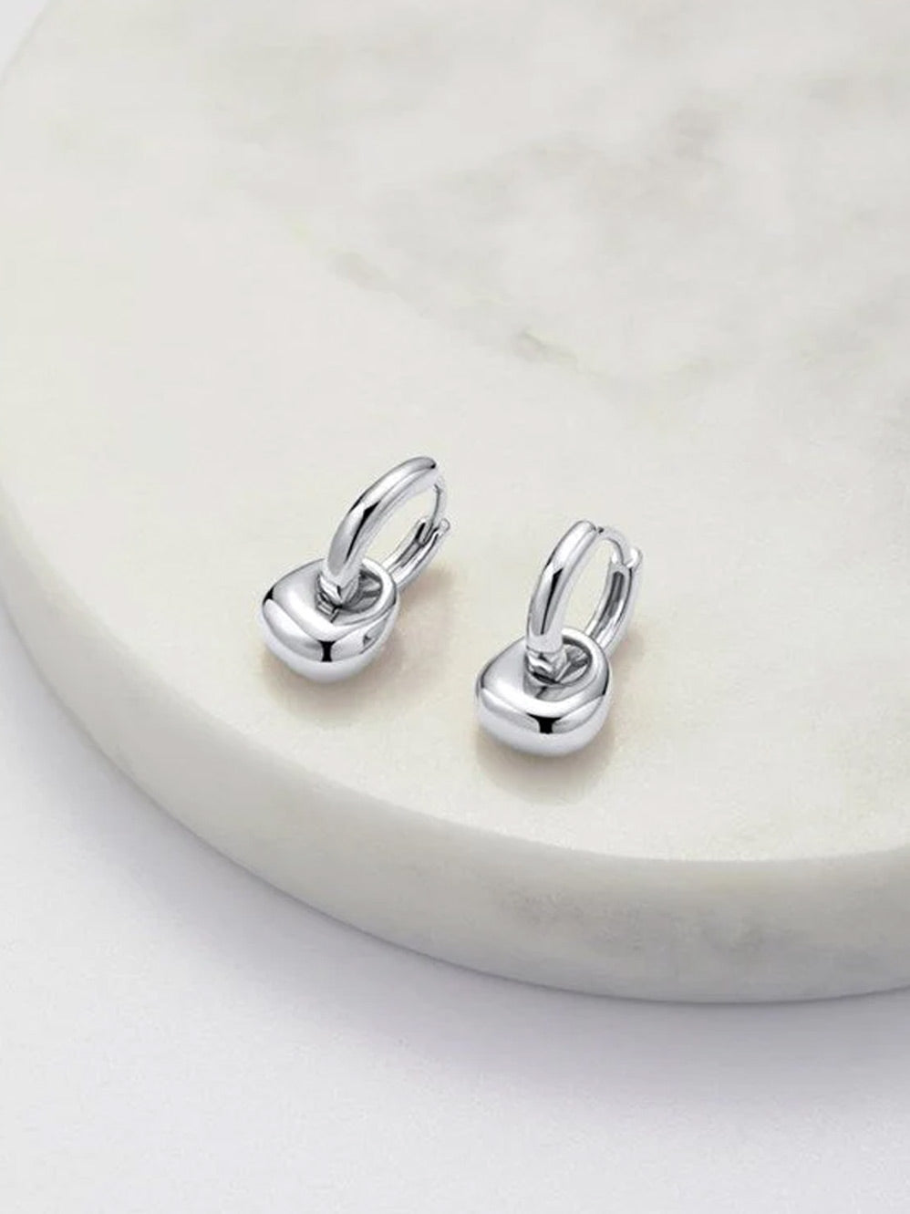 Image of Accessories. Product name - Zafino Sadie Hoop Earring in Silver colour by brand - Zafino