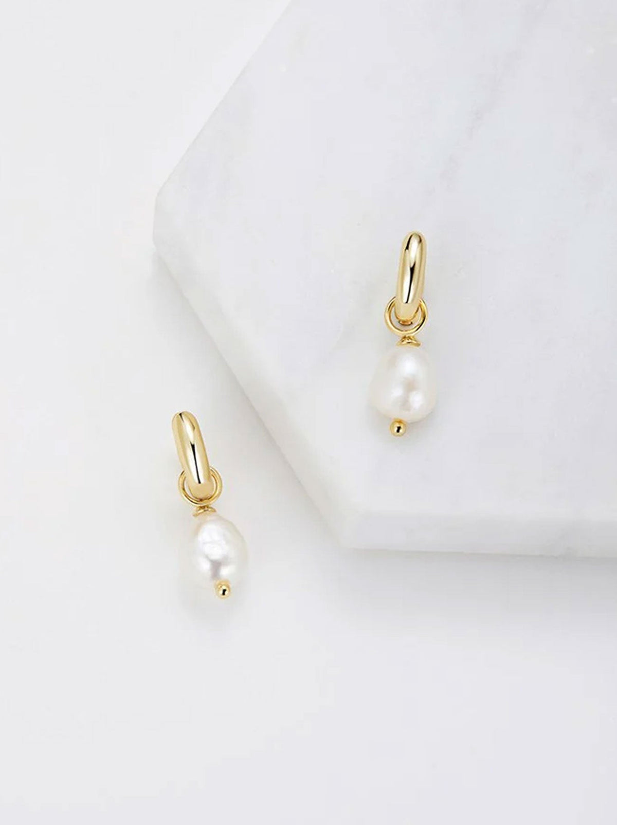 Image of Accessories. Product name - CHARLIE MINI HOOP in Gold colour by brand - Zafino