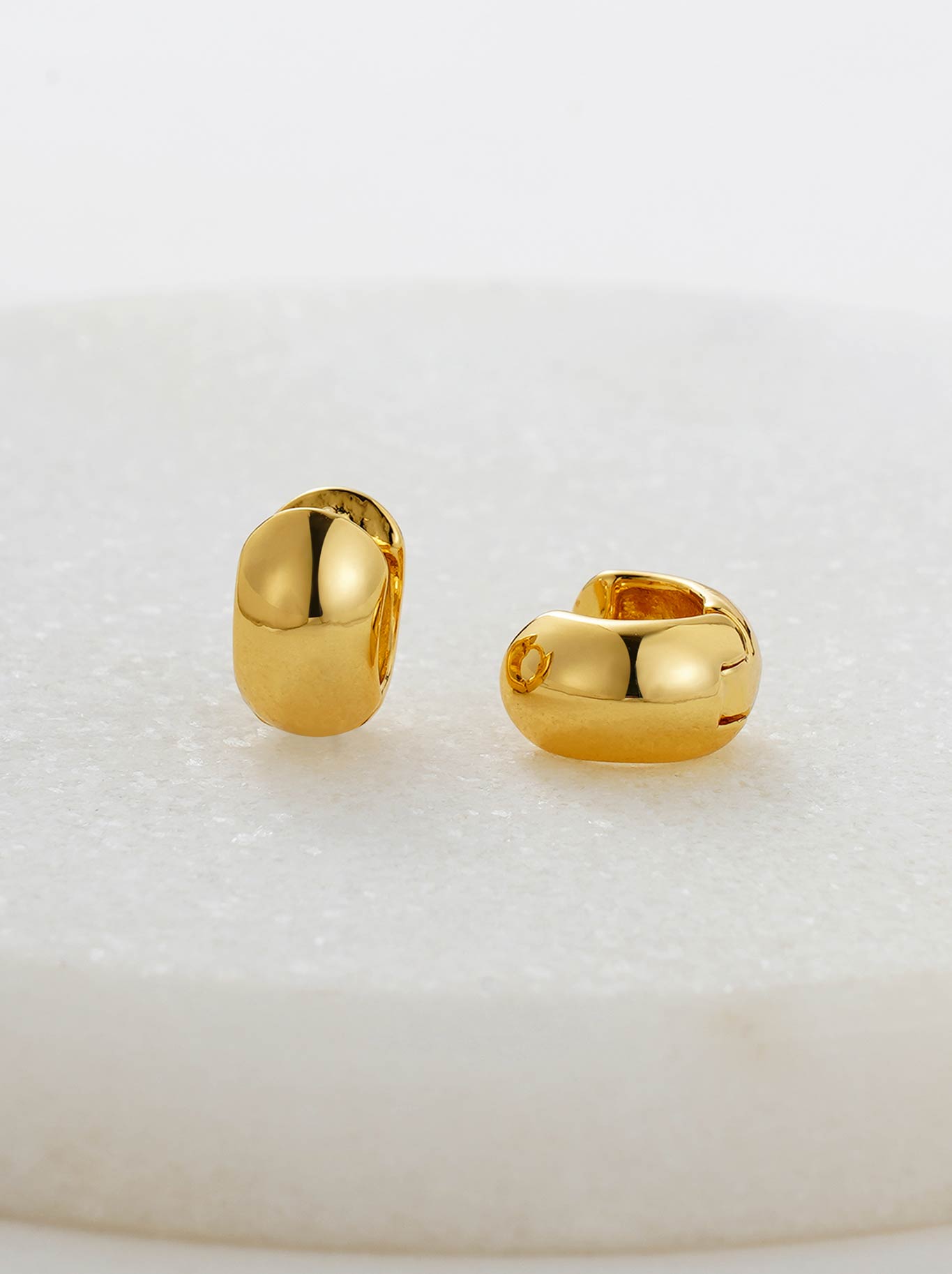 Image of Jewelry. Product name - Zafino Vada Huggie in Gold colour by brand - Zafino