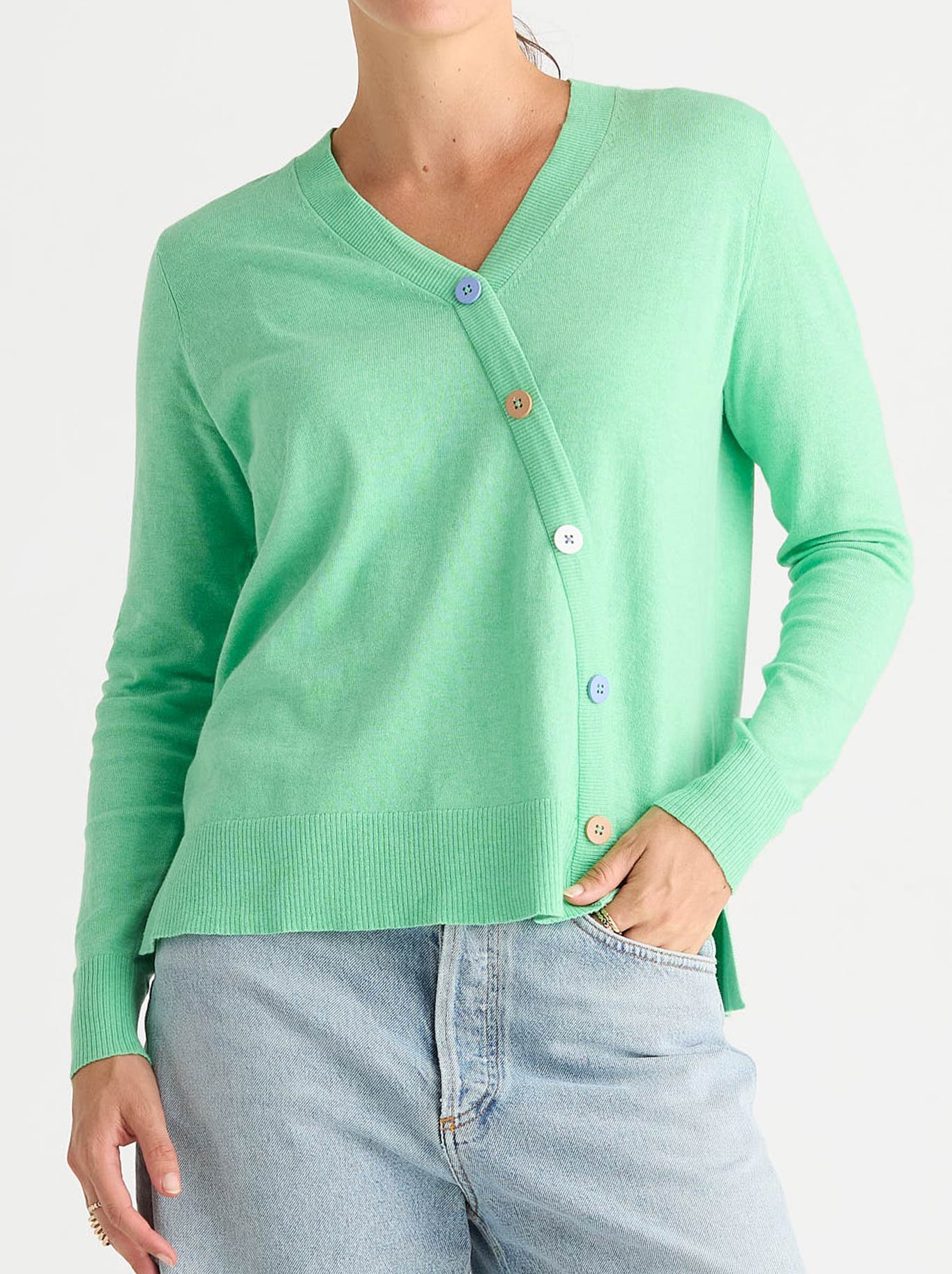 Image of a model wearing Outerwear. Product name - Zaket & Plover Button Angle Top in Jelly Mint colour by brand - Zaket And Plover