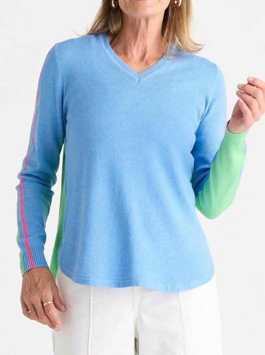Image of a model wearing Outerwear. Product name - Zaket & Plover Rounded Bottom Vee in Bluebell colour by brand - Zaket And Plover