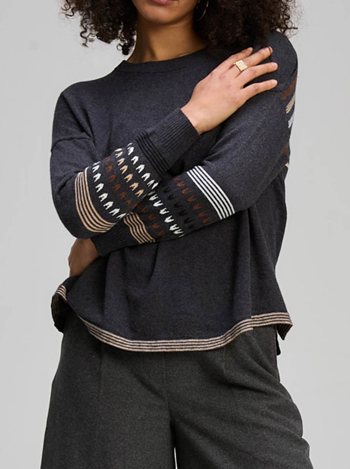 Image of a model wearing Outerwear. Product name - ZAKET & PLOVER TEXTURED SWING JUMPER in Dark Denim colour by brand - Zaket And Plover