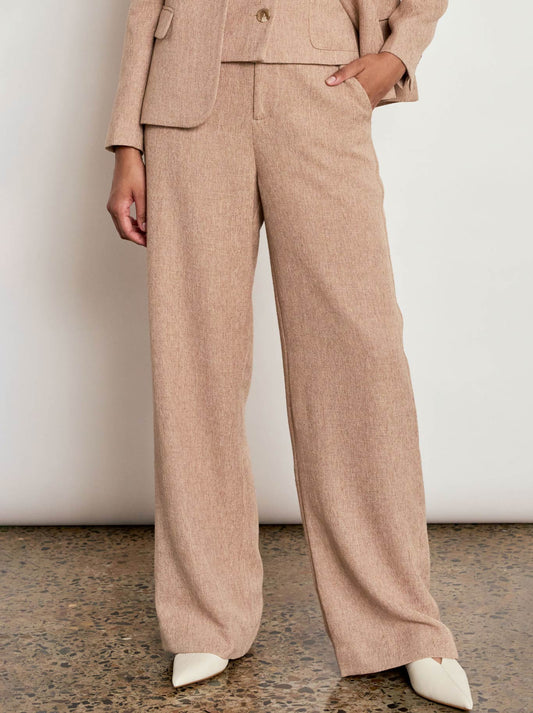 Image of a model wearing Pants. Product name - Zoe Kratzmann Driftline Pant in Pebble colour by brand - Zoe Kratzmann