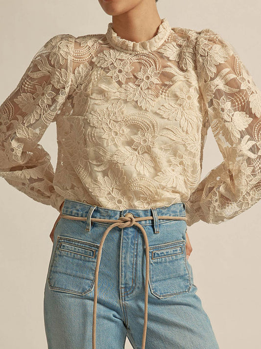 Image of a model wearing Tops. Productname: ZOE KRATZMANN GLINT TOP in Black colour by brand - Zoe Kratzmann