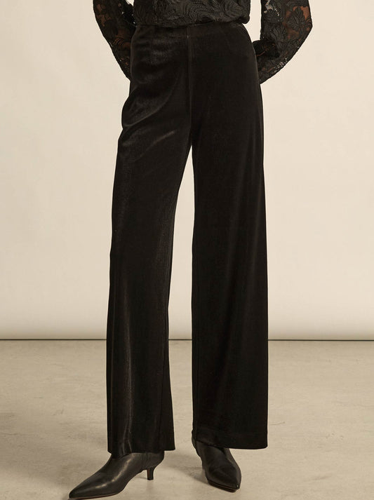 Image of a model wearing Pants. Productname: Zoe Kratzmann Haven Pants in Black colour by brand - Zoe Kratzmann