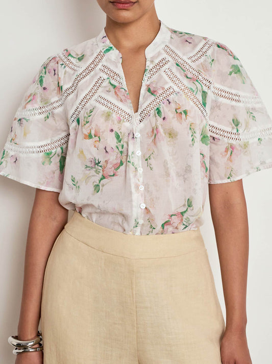 Image of a model wearing Tops. Product name - Zoe Kratzmann Pulse Top in Painterly Bloom colour by brand - Zoe Kratzmann