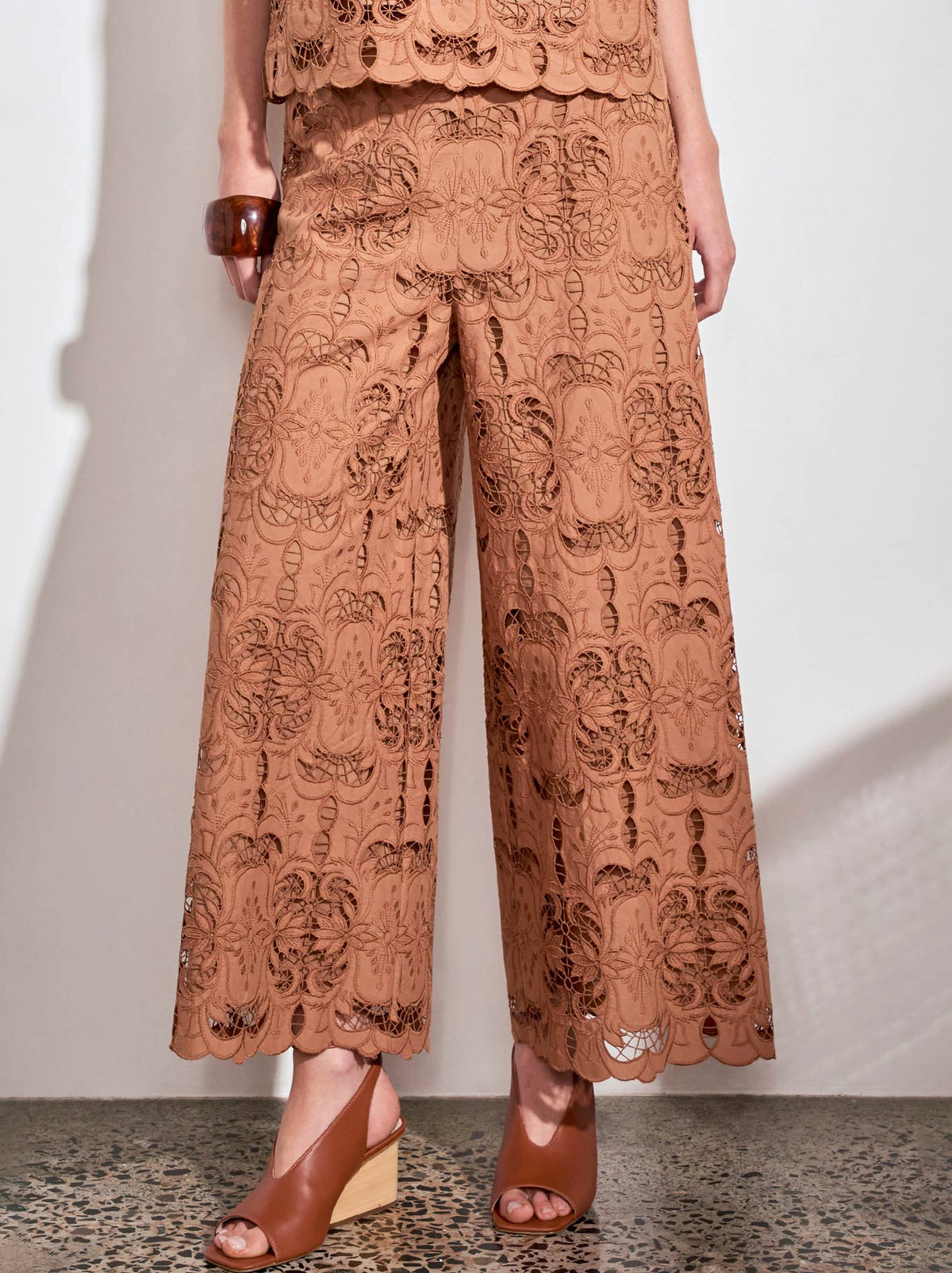 Image of a model wearing Pants. Product name - ZOE KRATZMANN SURGE PANT in Truffle colour by brand - Zoe Kratzmann