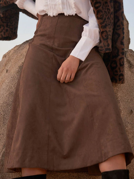 Image of a model wearing Skirts. Productname: Zoe Kratzmann Stellar Skirt in Mocha colour by brand - Zoe Kratzmann