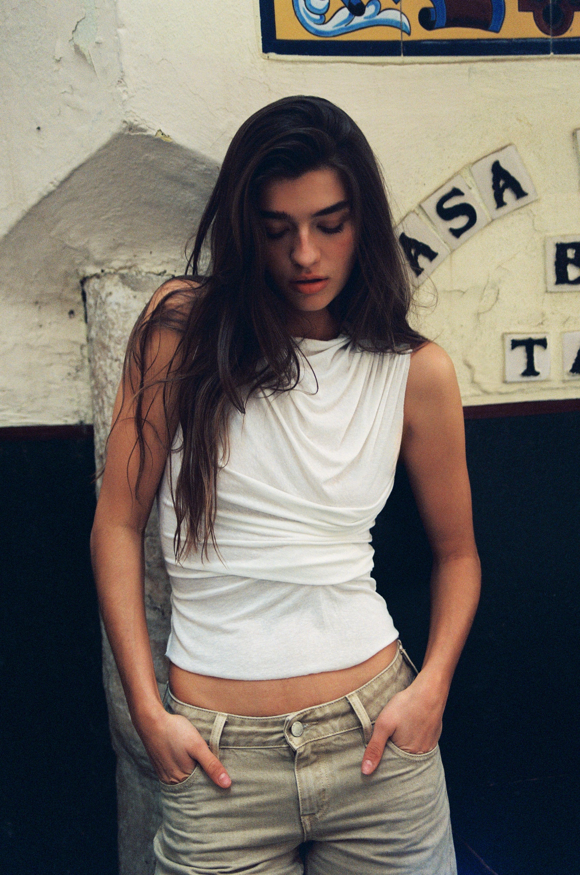 Image of a model wearing Tops. Product name - Adelaide Top in White colour by brand - With Jéan
