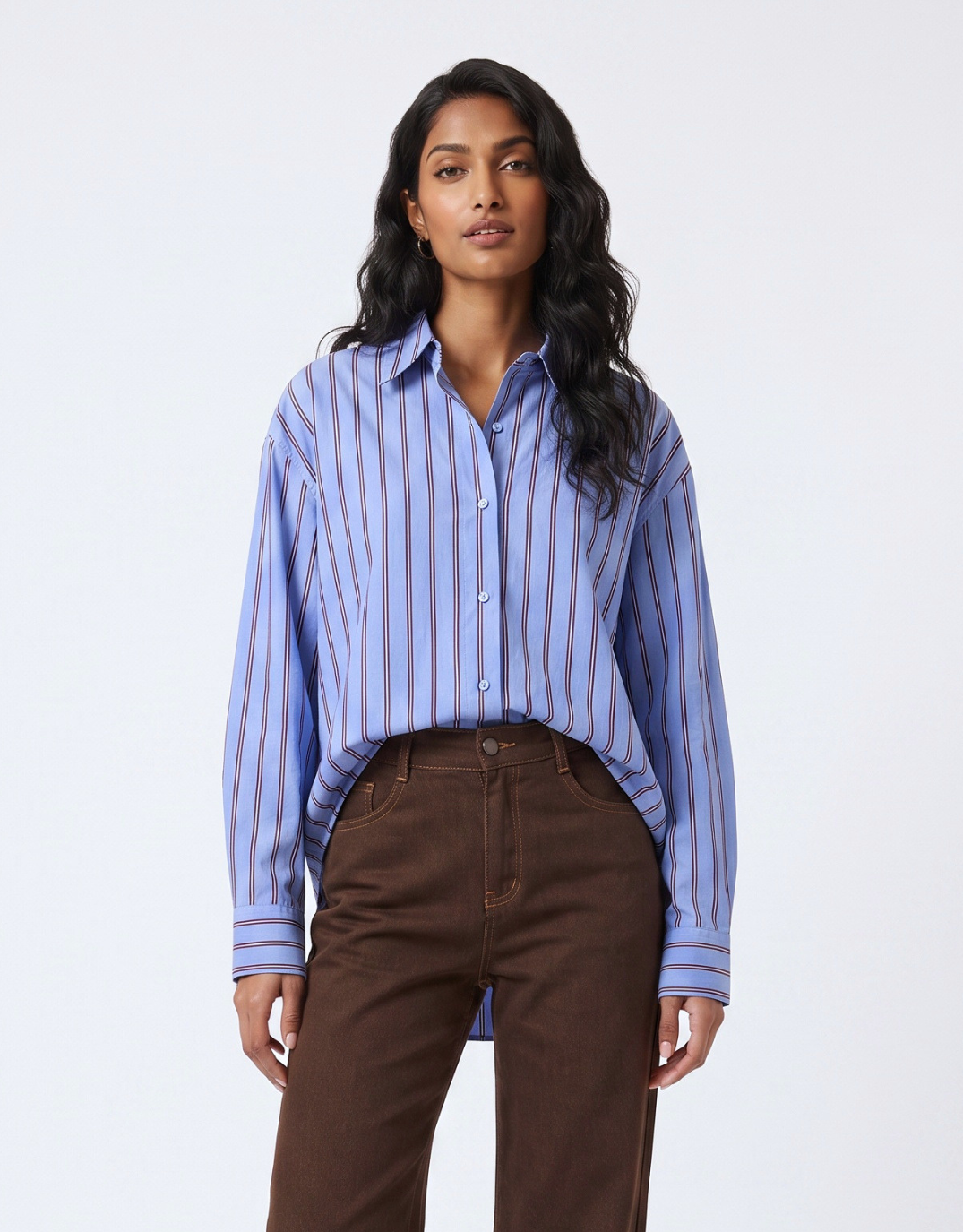 Image of a model wearing Tops. Product name - Alba Shirt Cornflower Blue in Cornflower Blue colour by brand - Foxwood