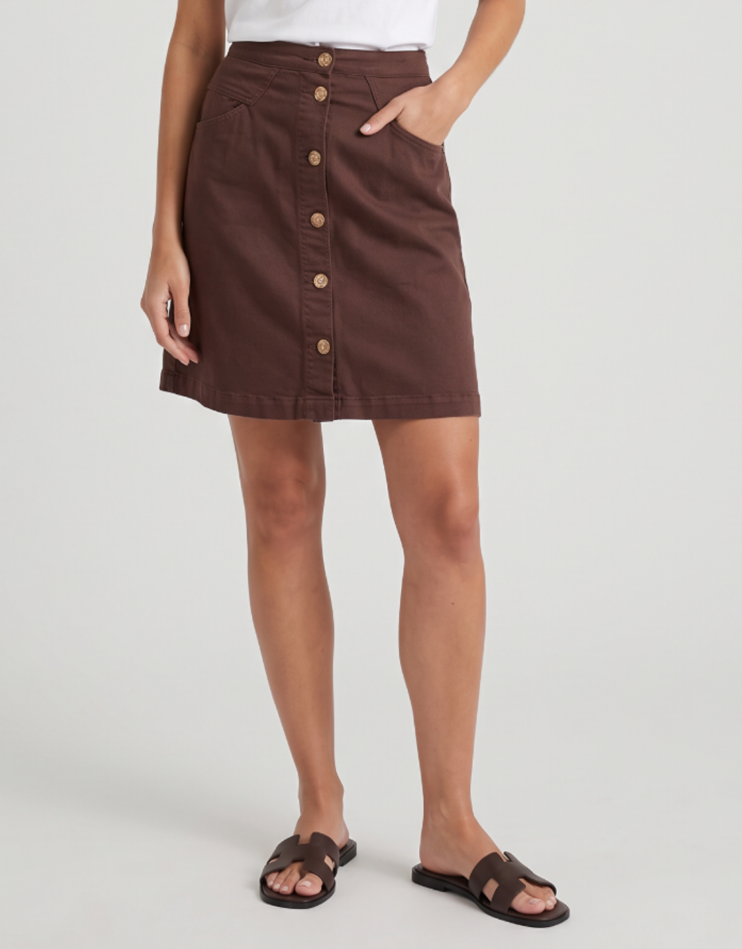 Image of a model wearing Skirts. Product name - Amanda Skirt Chocolate in Chocolate colour by brand - Foxwood