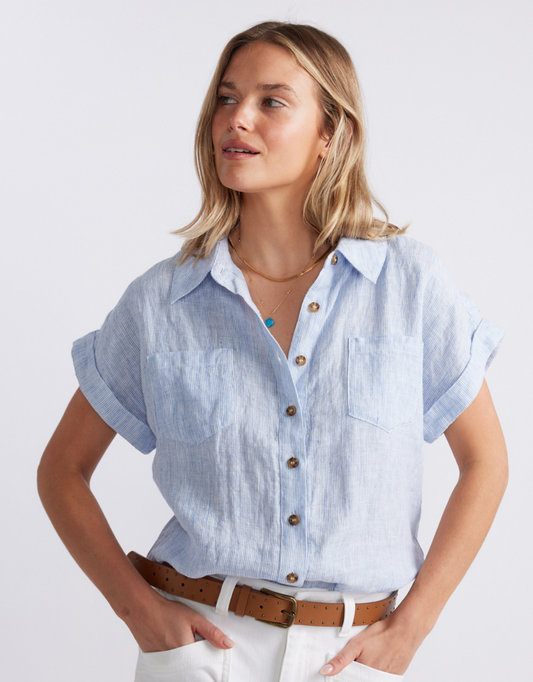 Image of a model wearing Tops. Product name - Amber Striped Linen Shirt Blue/White Stripe in Blue/White Stripe colour by brand - White & Co.