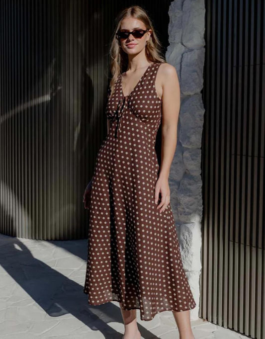 Image of Dresses. Productname: Infinity Sleeveless Bias Midi Dress - in Chocolate Polka Dot colour by brand - Among the Brave