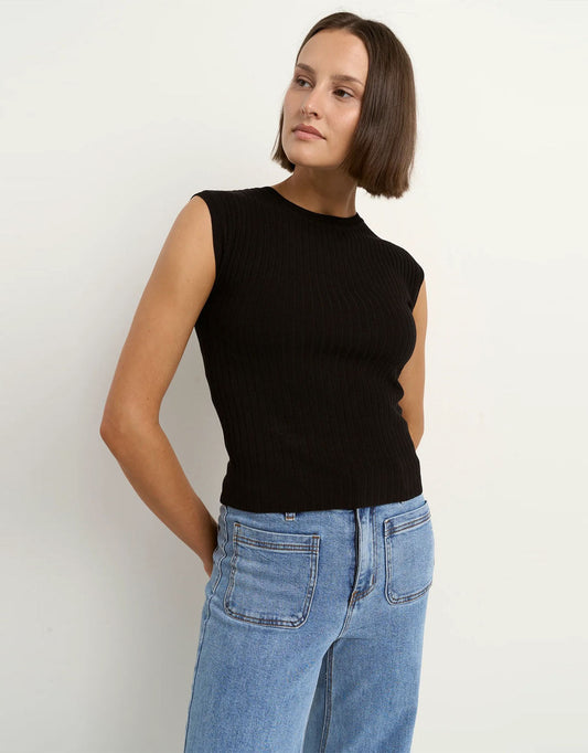 Image of a model wearing Outerwear. Productname: Subject Rib Knit Tank - in Black colour by brand - Among the Brave