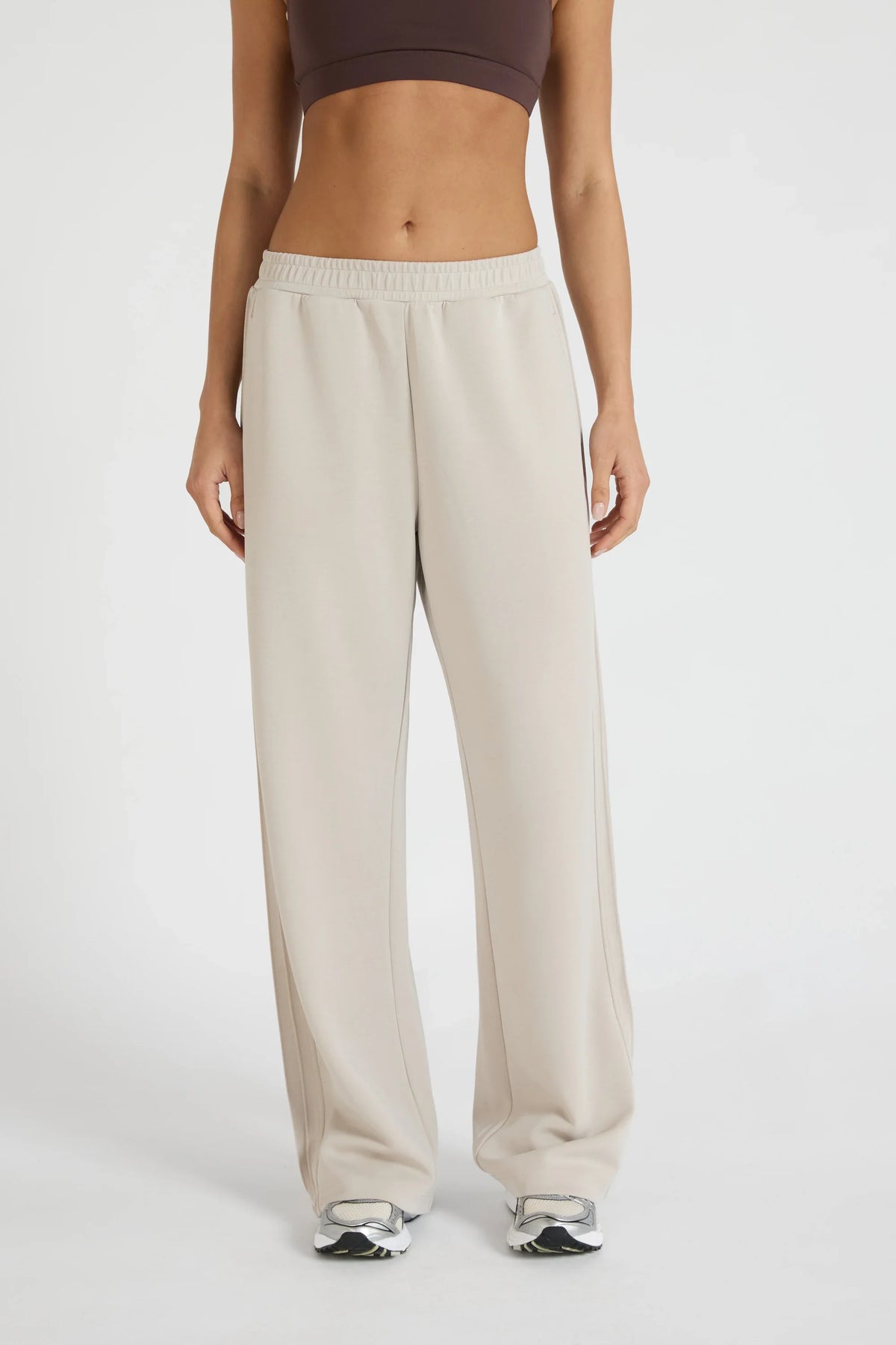 Image of Activewear. Product name - ALLFENIX Soft Luxury Pin Tuck Wide Leg Track Pant in Stone colour by brand - All Fenix