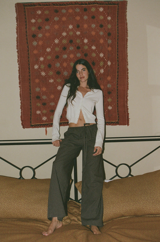 Image of a model wearing Pants. Product name - Arthur Pants in Check colour by brand - With Jéan