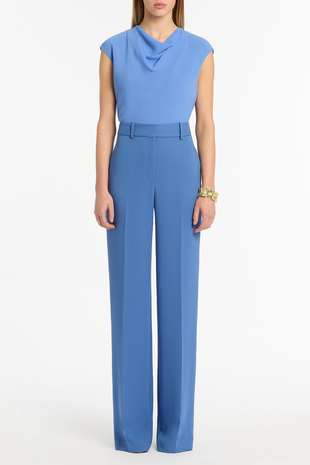 Image of a model wearing Pants. Product name - Atlas Crepe Straight Leg Pant in Blue colour by brand - Carla Zampatti