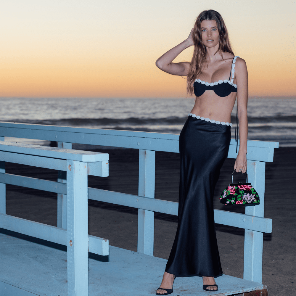 Image of a model wearing Tops. Productname: AUDREY Sequin Top Handle in colour by brand - Olga Berg