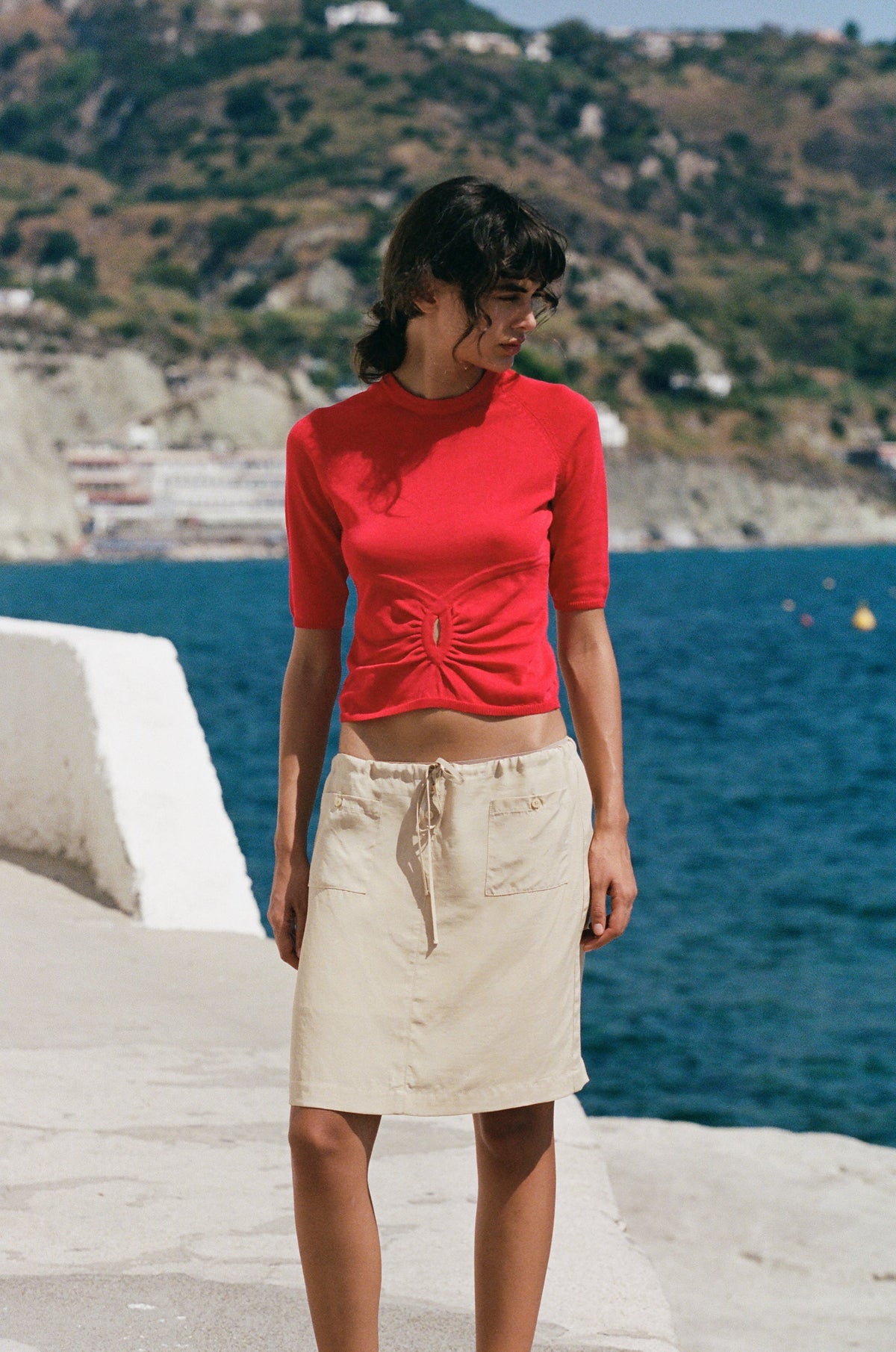 Image of a model wearing Tops. Product name - Avery Top in Red colour by brand - With Jéan