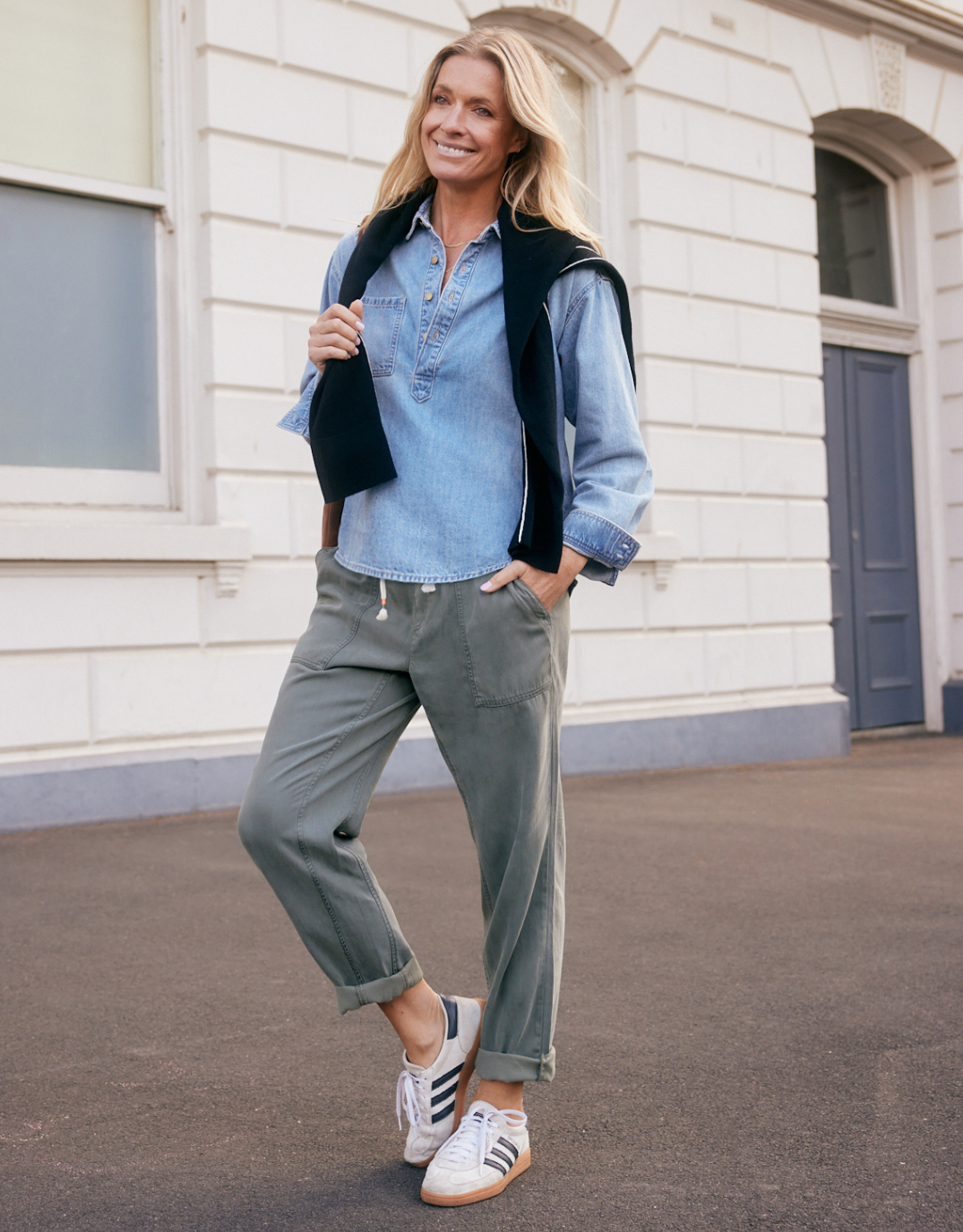 Image of a model wearing Pants. Product name - Beach Comber Pant Khaki in Khaki colour by brand - White & Co.