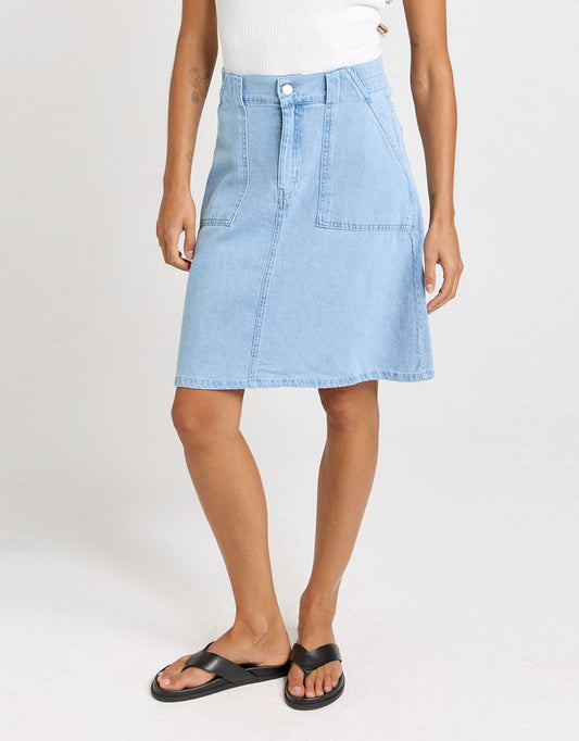 Image of a model wearing Skirts. Product name - Aida Denim Skirt Medium Wash in Medium Wash colour by brand - Betty Basics