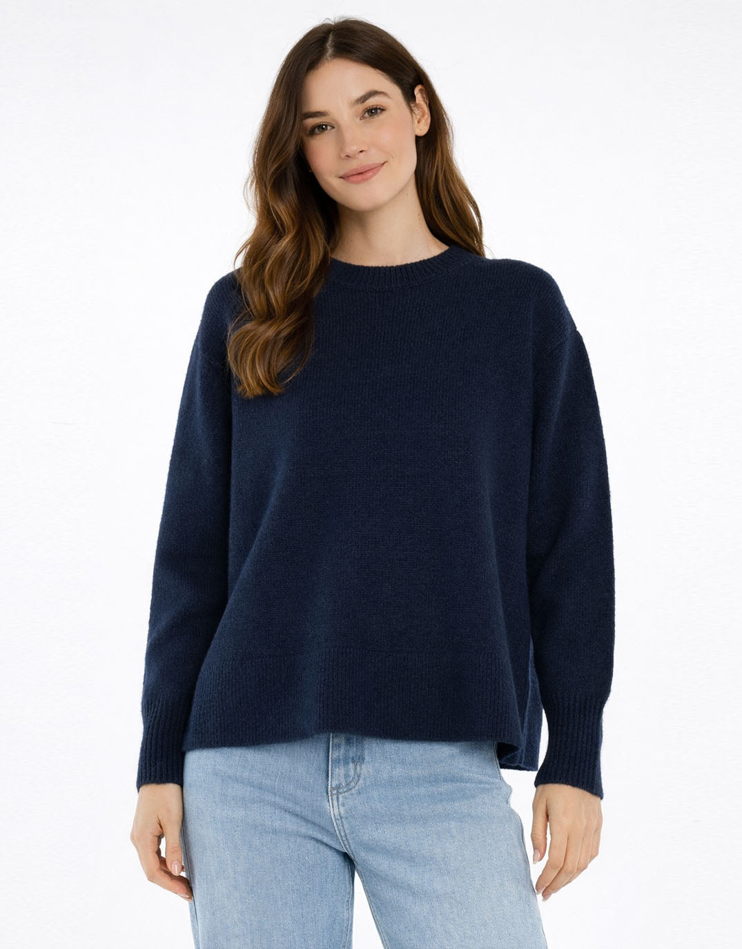 Image of a model wearing Outerwear. Product name - Camryn Knit Sweater Navy in Navy colour by brand - Betty Basics
