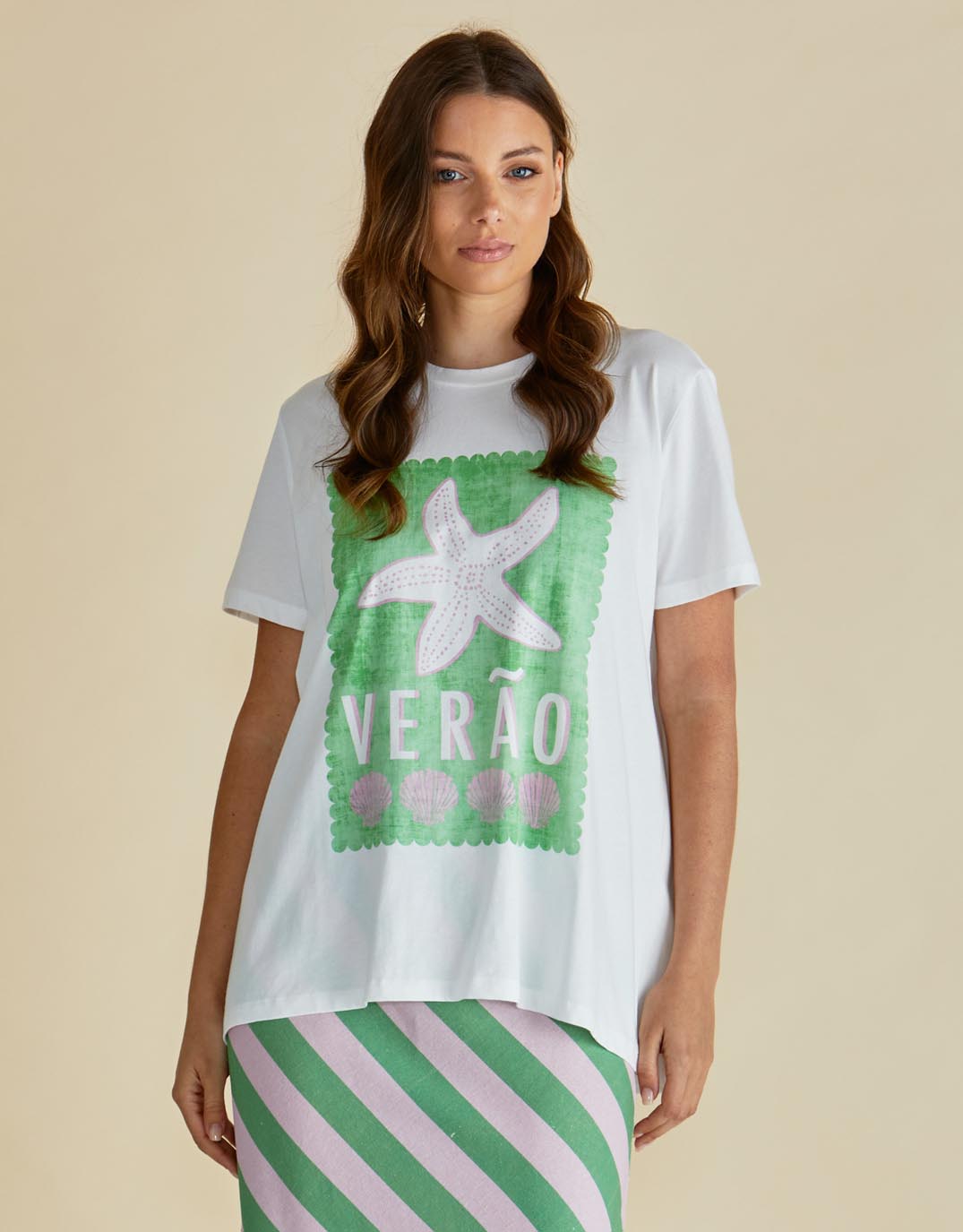 Image of a model wearing Tops. Productname: Ellia Crew Tee - in Verao Print colour by brand - Betty Basics