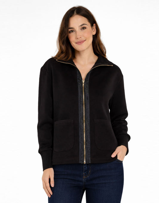 Image of a model wearing Outerwear. Product name - Sabina Sweatshirt Black in Black colour by brand - Betty Basics